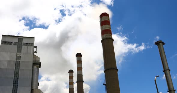 Industrial Factory With Smokestacks