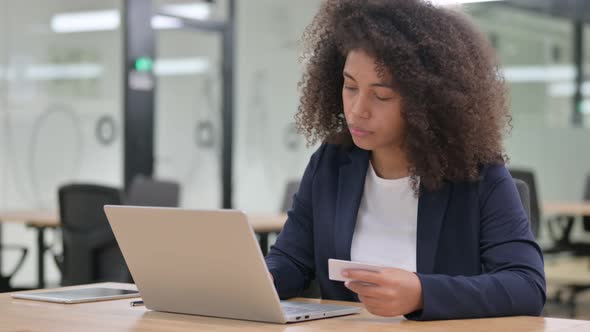 African Businesswoman Having Online Payment Success on Laptop 