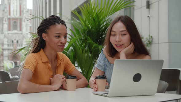 Close Up Two Caucasian Female Best Friends Involved in Video Call Talk Gossiping on Sharing Life