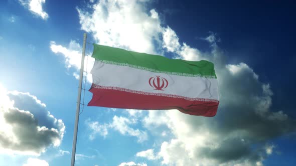 Flag of Iran Waving at Wind Against Beautiful Blue Sky