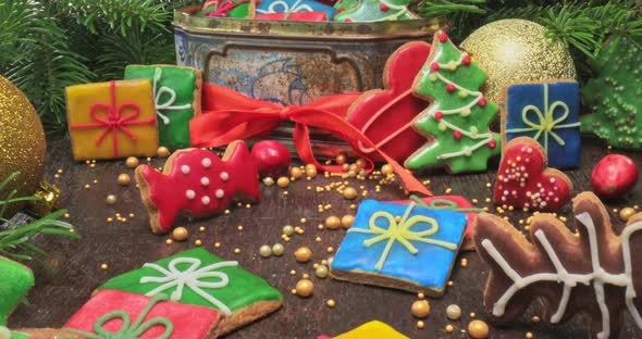 Gingerbread cookies for Christmas in box. Decorated gingerbread and spruce.