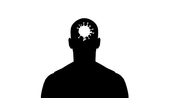 silhouette of a man and covid-19 virus in a human head.