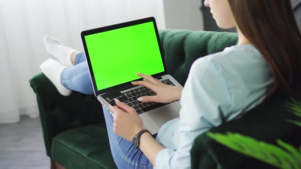 Young Woman Rejoices for Successful Online Payment By Credit Card