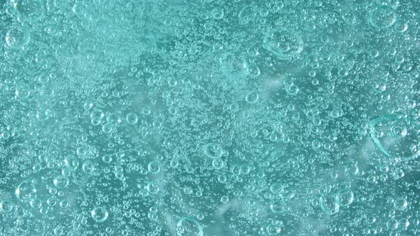 Macro Shot of Air Bubbles in Transparent Cosmetic Liquid Gel Cream