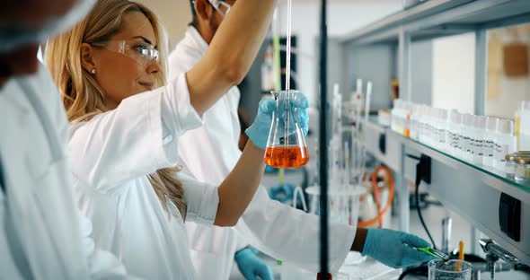 Female Student of Chemistry Working in Laboratory