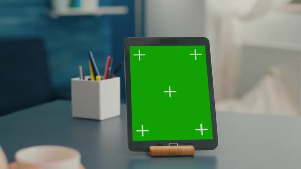 Close Up of Tablet Computer with Mock Up Green Screen Chroma Key Display