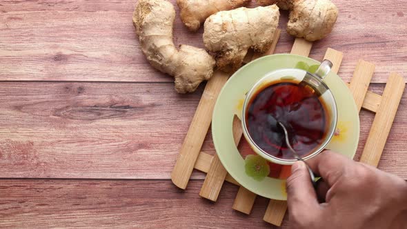 Top View of Ginger Tea on Wooden Background