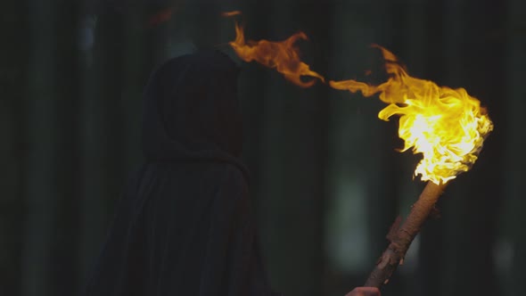 Woman with fire torch