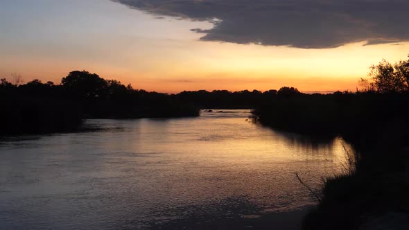 Sunset at a river in Bwabwata National Park