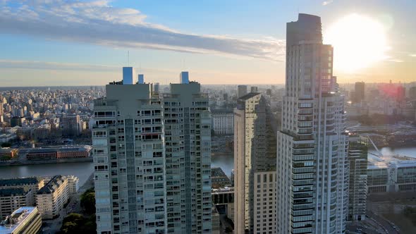 4K Aerial Drone Footage Rotating Around Modern Apartments During Sunset in Puerto Madero, Buenos Air