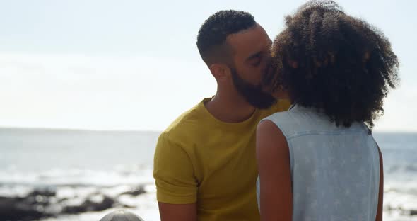 Couple kissing each other at beach 4k