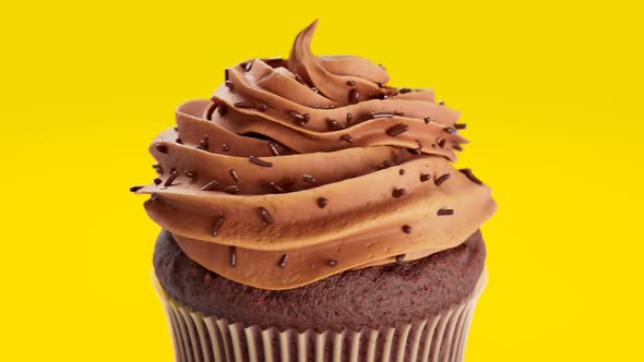 Seamless loop animation of a delicious cupcake with chocolate cream, sprinkles.