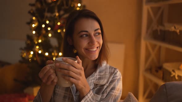 Close Up Shot Happy Dreaming Girl Holding Xmas Lights and Awaiting Miracle Happen on Christmas and