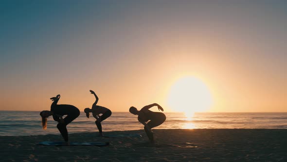 Group Of Women Practicing Yoga