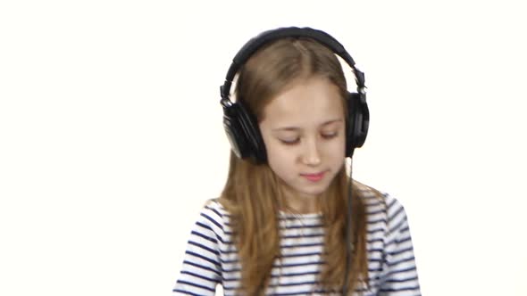 Girl Dj Wears Headphones on Head. White Background, Close Ups