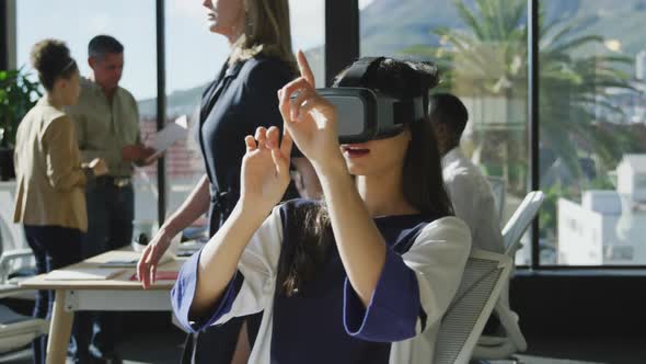 Young woman wearing VR headset