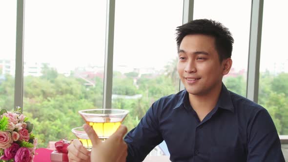 Happy Romantic Couple Eating Lunch at Restaurant