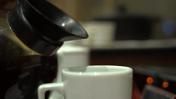 Filter Coffee in White Glass Close Up 4K