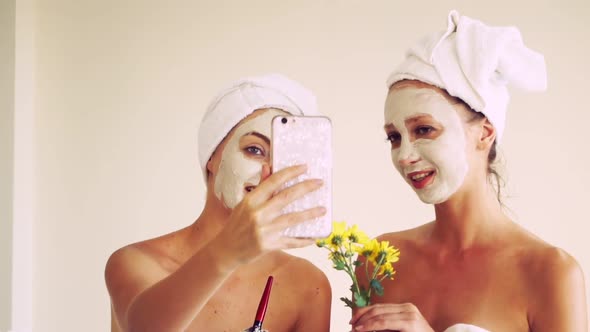 Beautiful Woman Having a Facial Treatment at Spa