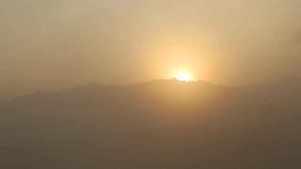 Timelapse of foggy sunrise on the Little Adam's Peak in Ella, Sri Lanka