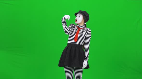 Mime Girl Fooling Around and Gesticulating. Green Screen, Chroma Key