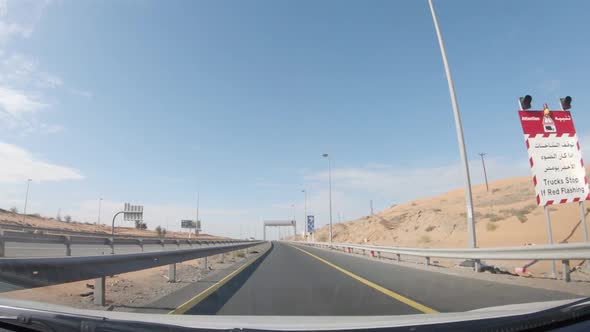 Road Control Middle Eastern Road Trip Firstperson View in a Moving Car on a Deserted Road View From