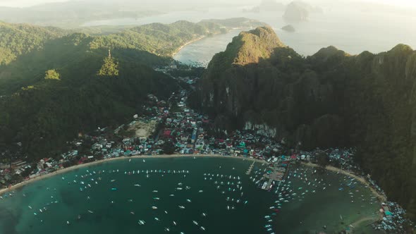 Tourist Boats in a Bay with Blue Water