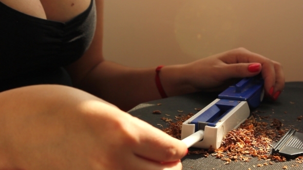 Girl Making Cigarette 2
