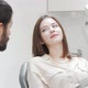 Lovely Young Woman Having Her Teeth Checked By Dentist - VideoHive Item for Sale