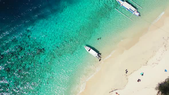 Wide angle fly over abstract view of a sunshine white sandy paradise beach and blue ocean background