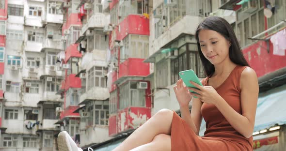 Woman working on mobile phone 