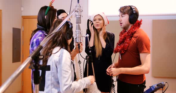 Singers performing in studio