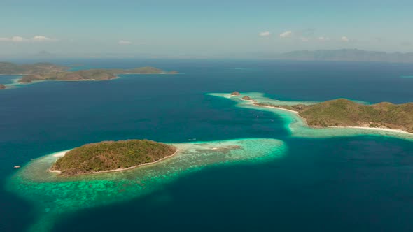 Small Torpic Island with a White Sandy Beach Top View