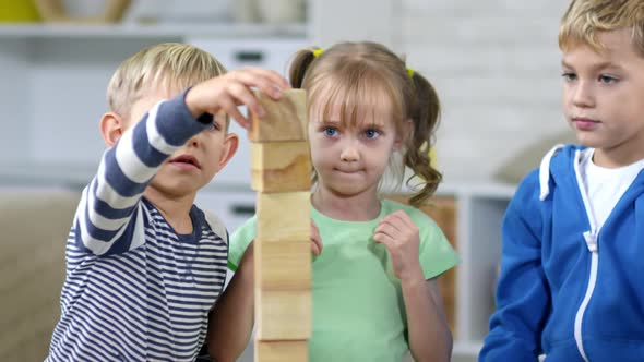 Playing with Wooden Toy Blocks alt