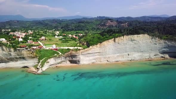 Greece, Corfu Island, drone footage of a beautiful cliff. Drone flying sideways.