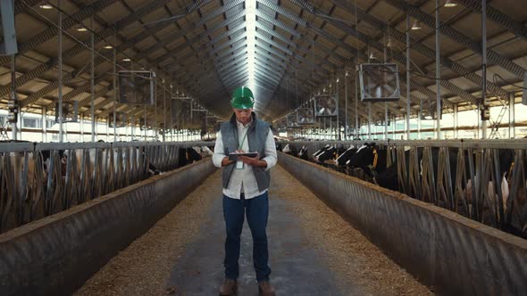 Animal Farmer Hands Holding Tablet Closeup