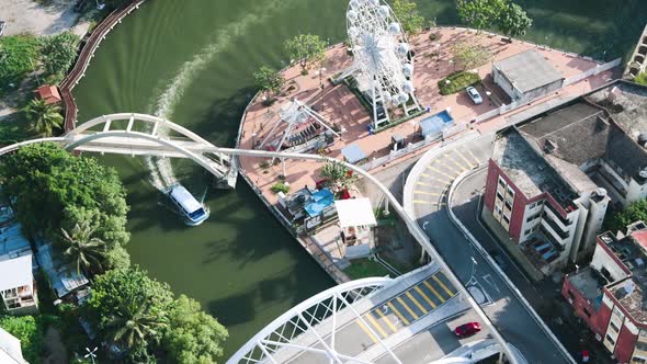 Downward Aerial View of Malacca River and Skyline