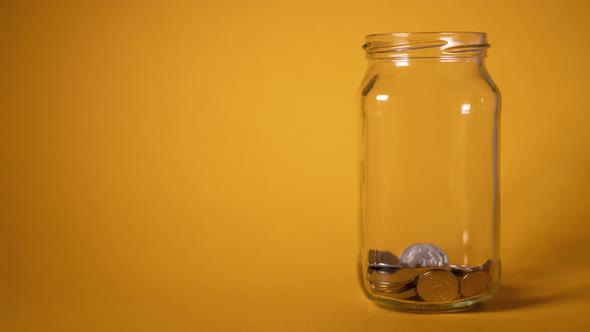 Money Coin in Glass Bottle Growing Money