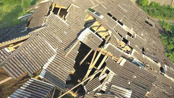 Aerial Shot of the Destroyed Roof of an Abandoned Cattle Barn