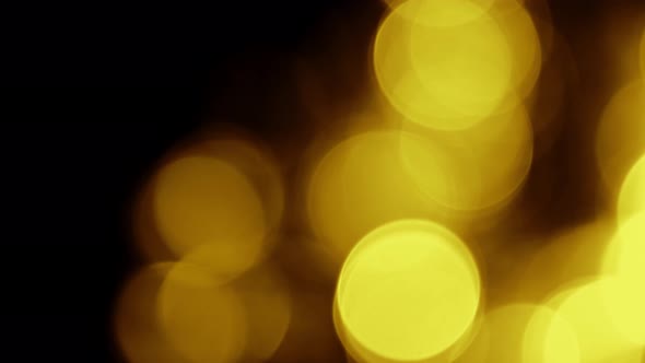 Gold Yellow Bokeh Particles Background