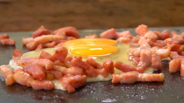 Egg with Minced Bacon Fried on the Grill