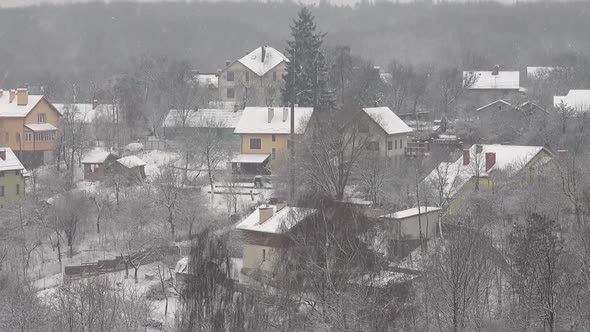 Houses and Snowstorm