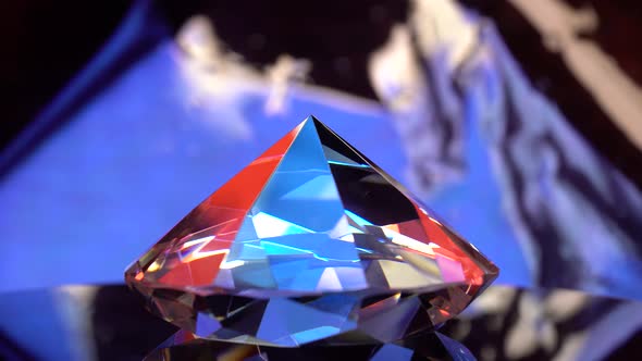 Infinitely Rotating Diamond Mirroring Orange and Blue Color