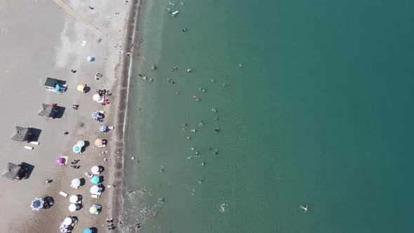 Beach People Sunbathing Swim Drone