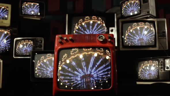 Old Fashioned Carousel and Stack of Vintage TVs.