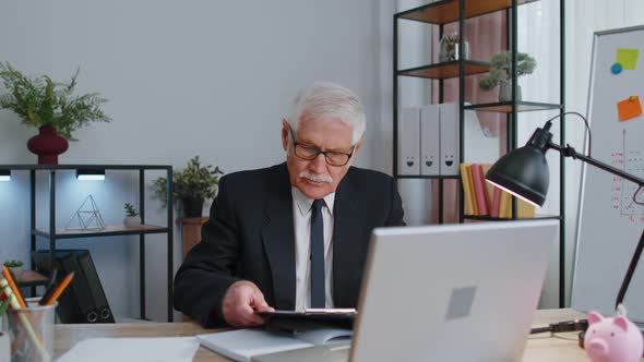 Senior Business Man Analysing Paperwork Documents Loses Bad Fortune Loss Deadline Problem