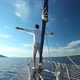 Man standing on the bow of sailing boat on Mediterranean sea. - VideoHive Item for Sale