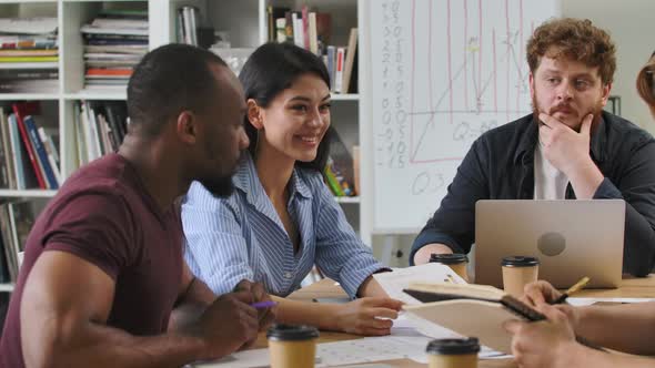 Friendly Diverse Colleagues Team Discuss Startup Project