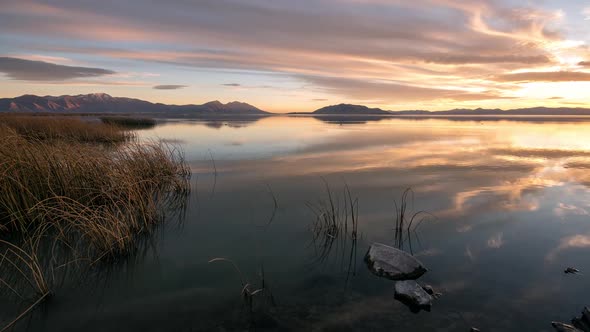 Panning time lapse turning towards the sunset over Utah Lake