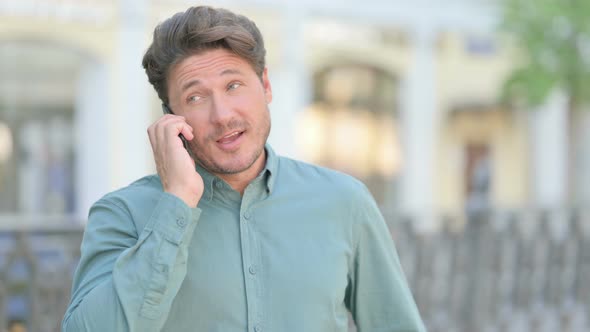 Outdoor Man Talking on Phone